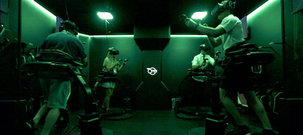 Two players competing on Omni treadmills